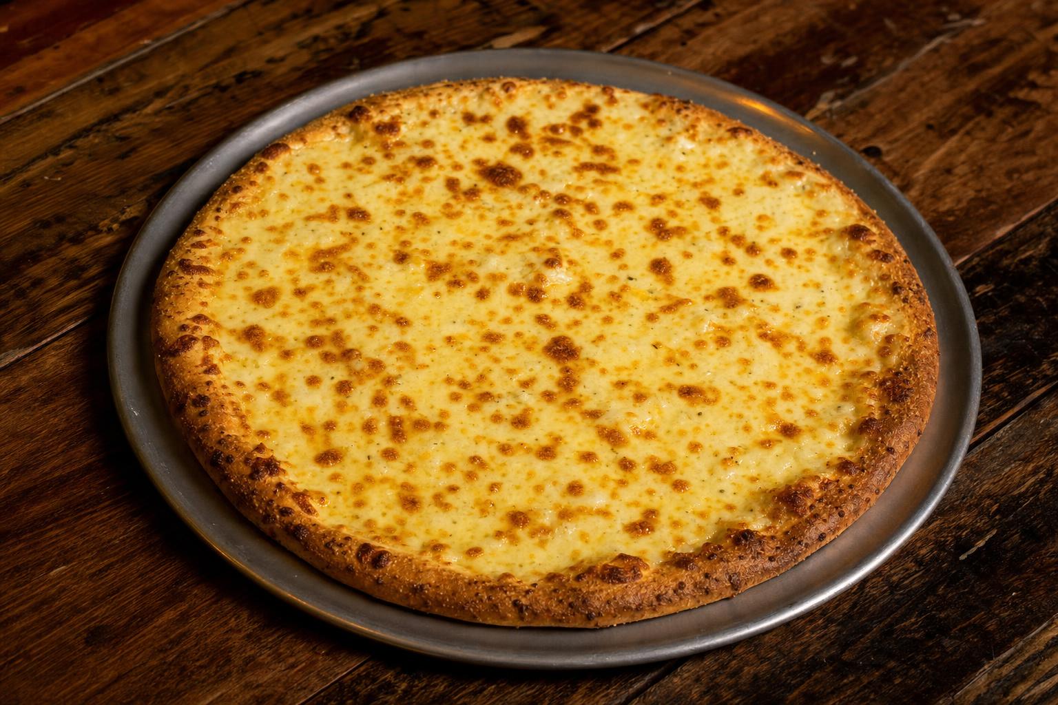 Garlic Cheese pizza with garlic butter sauce and mozzarella cheese on a warm wood table.